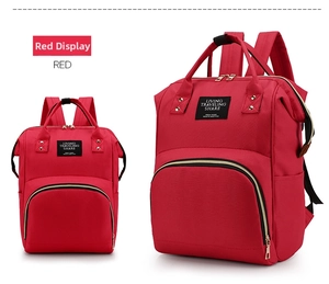 Front and side view of a red waterproof Oxford cloth diaper bag with large capacity pocket