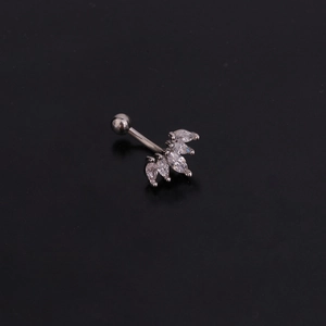 Close-up of silver stainless steel curved barbell featuring fan-shaped marquise zircons