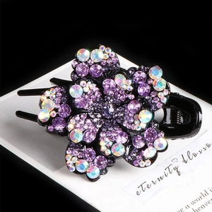 Elegant crystal flower ponytail clip featuring purple rhinestones and iridescent accents