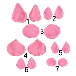 Detail view of pink silicone petal and leaf molds for fondant flower cake decorating