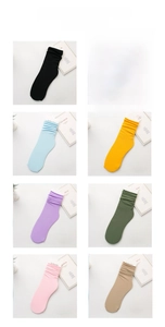 Detailed close-up of breathable velvet crew socks in eight vibrant solid colors