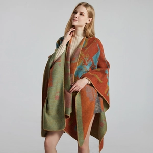 Women's jacquard patterned cashmere shawl in vibrant orange, green, and blue blocks