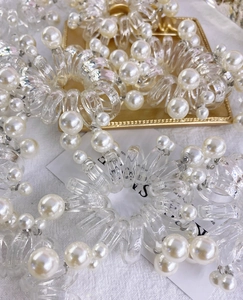 Macro di elastico per capelli a spirale trasparente con eleganti perle artificiali