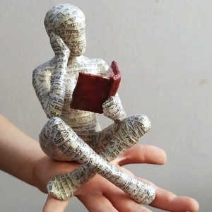 Artistic reading woman sculpture featuring Hebrew text print for bookshelf home decor