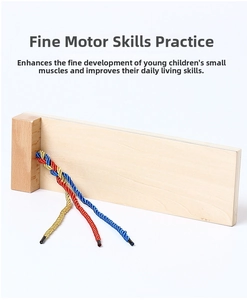 Macro shot of Montessori wooden board with red yellow and blue ropes for braiding skills