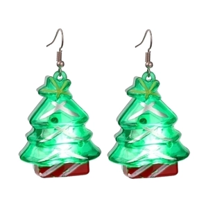 Detailed macro shot of green Christmas tree earrings with star toppers and red base decor