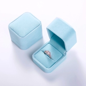 Sky blue velvet jewelry ring box shown in open and closed views on white background