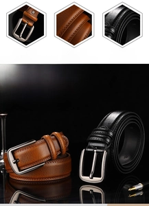 Macro details of brown and black leather belts with polished alloy buckles and sleek edges