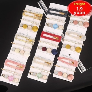 Three-piece acetate hair clip set with pearls and colorful geometric resin designs