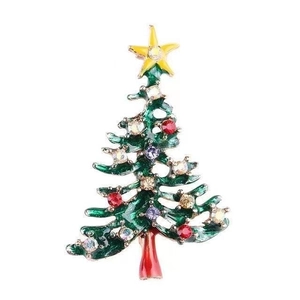 Close-up of sparkling Christmas tree brooch with colorful rhinestones on zinc alloy base