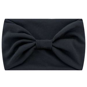 Black elastic yoga headband with bow design made of soft fabric on white background