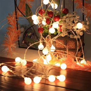 Solar powered warm white LED globe string lights for outdoor garden and patio decor