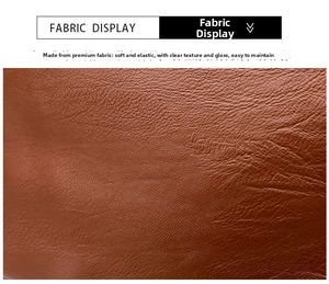 Close-up of soft brown litchi pattern leather fabric with smooth shiny texture