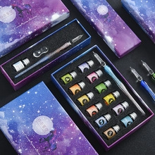 Macro view of crystal glass dip pen set with 12 colorful inks in starry sky gift box
