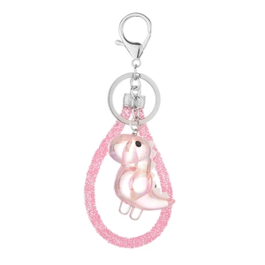 Pink transparent pearlescent dinosaur keychain with crystal studded wrist strap for bags