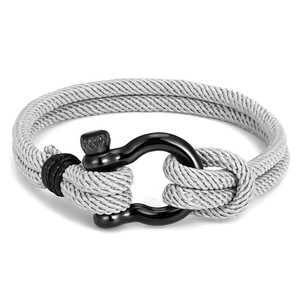 Detail of grey braided cord bracelet with black stainless steel horseshoe clasp