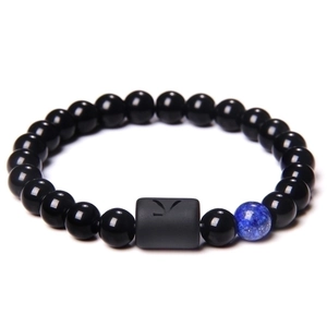 Pisces constellation beaded bracelet with black polished stones and blue marble accent