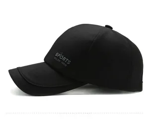 Side view of black outdoor baseball cap showing sports printed text and fabric texture