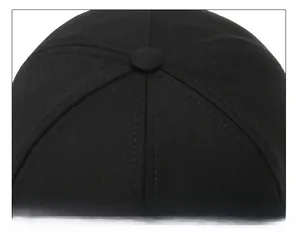 Detailed close-up of the black cotton twill baseball cap crown with neat stitching