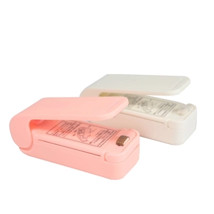 Mini portable food bag heat sealer in pink and white compact handheld design