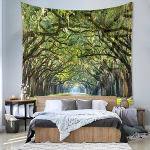 Detailed texture of bohemian forest landscape tapestry hanging in a cozy bedroom