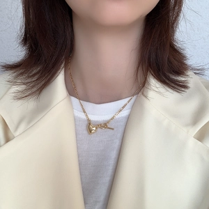 Detail of 925 sterling silver heart necklace with toggle clasp on model neck