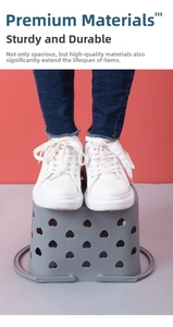 Strong grey plastic storage basket showing high load capacity with standing person detail