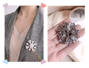 Detail of baroque flower pearl brooch with silver finish and secure pin clasp closure