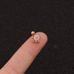 Pink zircon gold screw back stud earrings surrounded by clear crystals on fingertips