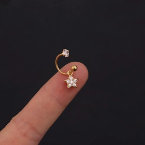 Golden C-shaped stainless steel ear stud with a zircon-studded star pendant detail