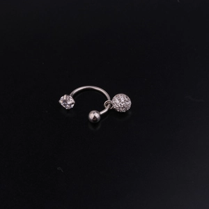 Detailed view of silver stainless steel C-ring with zircon pendant for ear piercing