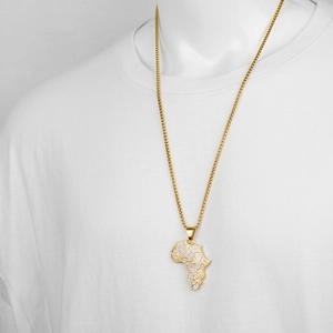Hip hop gold necklace with iced out Africa map pendant on white t-shirt model