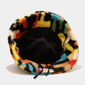 Colorful patchwork faux fur bucket hat featuring vibrant geometric panels for women