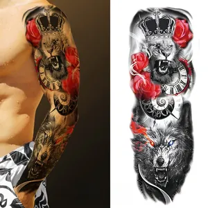 Detail of full arm temporary tattoo featuring realistic lion, wolf, and red rose designs