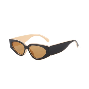 Fashionable cat-eye sunglasses with black and beige two-tone frame and amber lenses