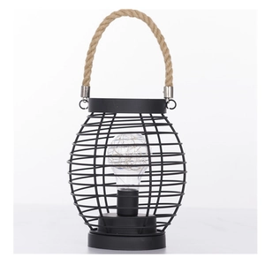 Detail of black cage decorative lamp with natural hemp rope handle and light bulb