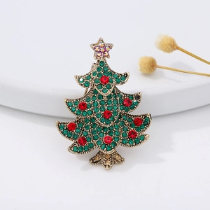 Sparkling Christmas tree brooch with green and red rhinestones on antique gold base