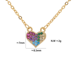 Macro view of multi-color heart pendant with rainbow stones and dimension markings