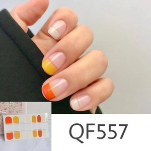 Detail of QF557 daisy nail stickers showing French style floral patterns and model wear