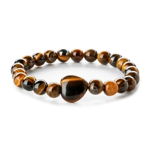 Tiger Eye beaded bracelet featuring a heart-shaped centerpiece stone on white background