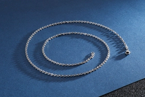 Detail view of silver stainless steel O-chain necklace with secure lobster clasp finish