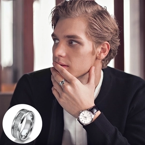 Polished titanium steel ring for men featuring unique textured stone inlay detail