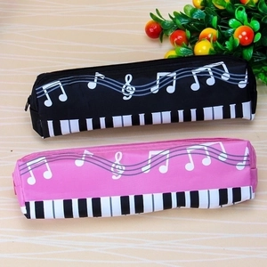 Minimalist canvas pencil cases with piano keys and musical notes in pink and black