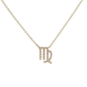 Close-up of gold Virgo zodiac pendant necklace with sparkling cubic zirconia inlay