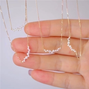 Elegant gold-plated S925 silver smile necklaces with pavé cubic zirconia pendants