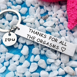 Polished stainless steel keychain with I Love You symbol and humorous text on blue stone base