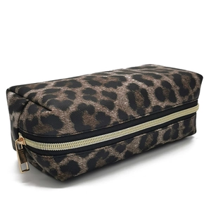 Detailed macro shot of the leopard print fabric and golden metal zipper of the makeup bag