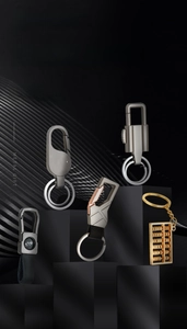 Close-up of premium metal keychains with zinc alloy hooks and leather details