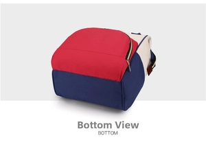 Detail view of the durable oxford fabric bottom with metallic zipper and leather accents