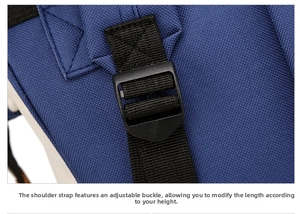 Detail of adjustable shoulder strap buckle on a blue Oxford cloth diaper backpack